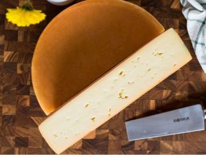 Raclette cheese on a cutting board