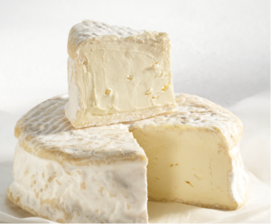 Brillat Savarin cheese wheel with wedge