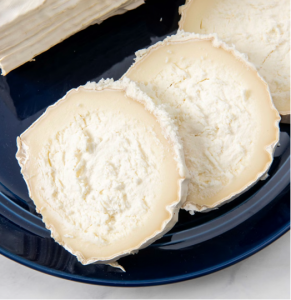 Bucheron cheese on a plate