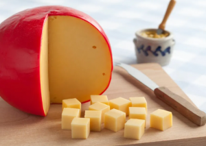Edam cheese on a cutting board