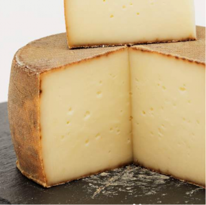 Timanoix Cheese wheel with wedge