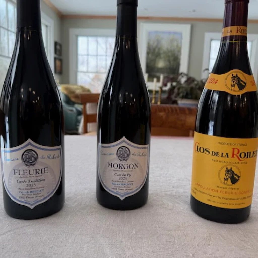 3 beaujolais wine bottles